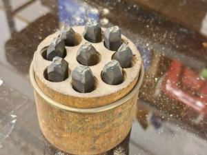 lot 592 image: Lot of (9) Numeric Punches with Wooden Stand