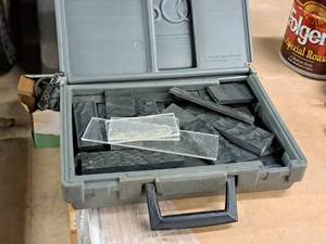 lot 669 image: Assorted Laminate Pieces with Case