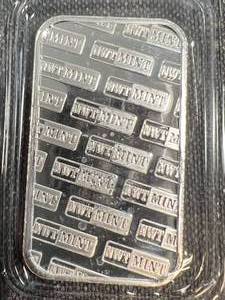 lot 22 image: 1 TROY OZ .999 FINE SILVER NW TERRITORIAL MINT BAR