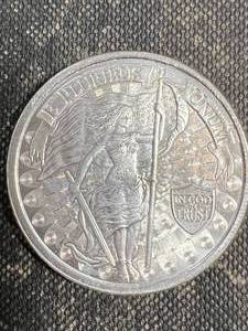 lot 27 image: 1 TROY OZ .999 FINE SILVER UNITY ROUND