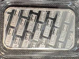 lot 59 image: 1 TROY OZ .999 FINE SILVER NW TERRITORIAL MINT BAR