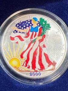 lot 80 image: 2000 AMERICAN SILVER EAGLE 1 TROY OZ .999 FINE SILVER IN FULL COLOR
