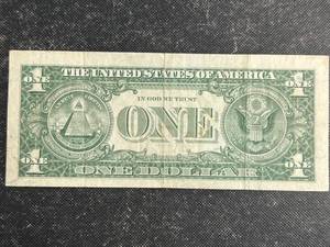 lot 84 image: 1957 US $1 BLUE SEAL SILVER CERT. US TREAS HAND SIGNED