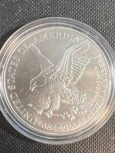 lot 15A image: 2023 AMERICAN SILVER EAGLE 1 TROY OZ .999 FINE SILVER IN AIRTITE