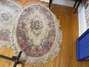 lot 263 image: Pair of Oval Pink Rugs