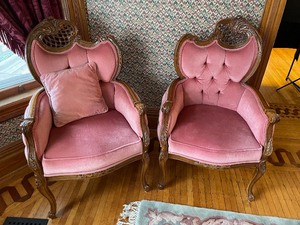 lot 204 image: Pair of Pink Mirrored Upholstery and Carved Wood Chairs