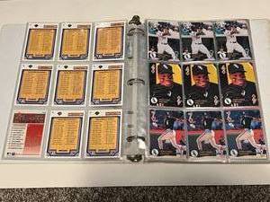lot 45 image: Frank Thomas Binder of 98 Baseball Cards
