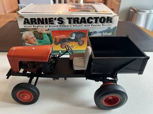 lot 151 image: Arnold Palmer Scale Replica Golf Course Tractor - Penzoil Golfs Most Famous Tractor