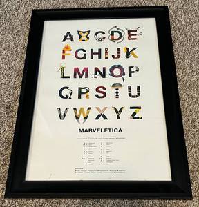 lot 193 image: Marveletica 15.5x21.5 Framed Print - Locally Designed A-Z Listing of Marvel Character Names