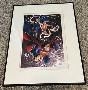lot 198 image: Artist Signed Superman Wonder Woman Batman Framed Poster 18x25 - Trinity by Christopher Jones