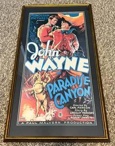 lot 194 image: John Wayne Framed Paradise Canyon Movie Poster 15x28