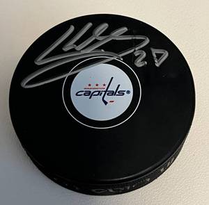 lot 207 image: Karl Alzner Autographed Hockey Puck with JSA COA