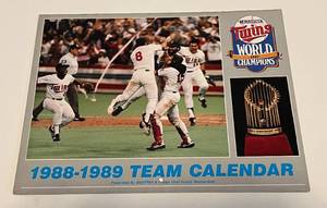 lot 214 image: Minnesota Twins 1988-89 Team Calendar Baseball - 1987 World Series Champions