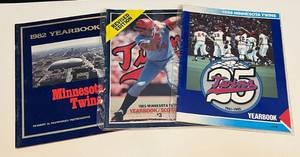 lot 262 image: Minnesota Twins 1982, 1985, and 1986 Yearbook and Scorecards (3) Vintage Baseball