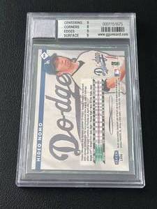 lot 92A image: Hideo Nomo Game Used Jersey Beckett Graded 8.5 - 1998 Fleer #540 Baseball Card