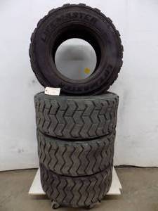 lot 2 image: 4 - Skid Loader Tires 12-16.5