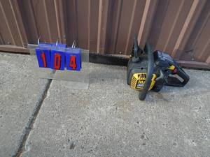 lot 104 image: Mcullough MAC3200 chainsaw. Fires on ether. Choke lever needs work. As shown.