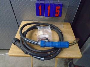 lot 115 image: New Miller 500 series Wire feed stinger. As shown. THIS ITEM HAS A RESERVE.