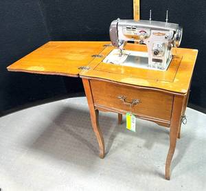 lot 304 image: Vintage Rare Dress Maker Version Good Housekeeping Sewing Machine