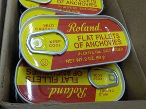 lot 210 image: Case of 100 x 2 oz Roland Flat Fillets of Anchovies Best By 08162023