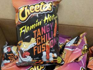 lot 218 image: Case of Cheetos Flamin Hot Tangy Chili Fusion Snacks 2.6 oz bags past best date