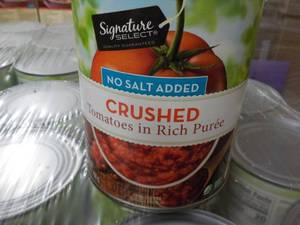 lot 221 image: 12 x 28oz Cans Signature Crushed Tomatoes