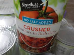 lot 222 image: 12 x 28oz Cans Signature Crushed Tomatoes