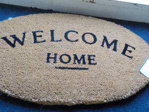 lot 73 image: Threshold Oval Welcome Home Door Mat 20 x 34