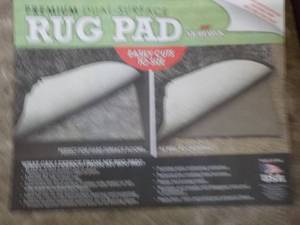 lot 84 image: Mohawk Premium Rug Pad-easily cuts to size