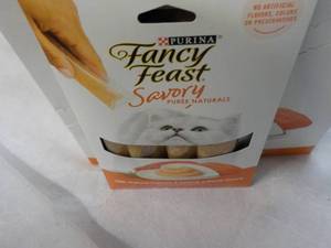 lot 101 image: 30 ct Purina Fancy Feast Savory Cat Treats Natural Salmon and Tuna in a Demi Glaze best date 082023 Retail $90 total