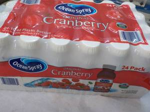 lot 303 image: 24 pack Ocean Spray Cranberry Juice...