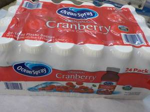lot 304 image: 24 pack Ocean Spray Cranberry Juice...
