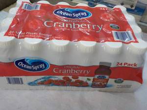 lot 306 image: 24 pack Ocean Spray Cranberry Juice...