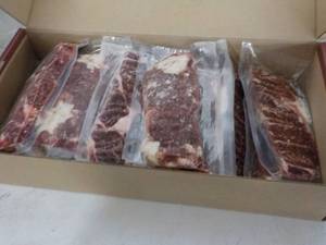 lot 317 image: L Beef Ribeye Frozen Lip-On Steak 11.70 lb. box