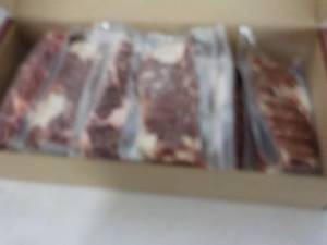 lot 319 image: L Beef Ribeye Frozen Lip-On Steak 11.40 lb. box