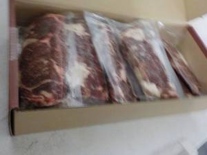 lot 320 image: L Beef Ribeye Frozen Lip-On Steak 10.70 lb. box