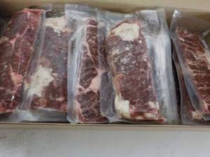 lot 321 image: L Beef Ribeye Frozen Lip-On Steak 10.60 lb. box