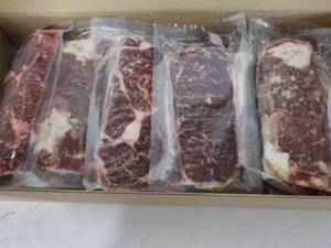 lot 323 image: L Beef Ribeye Frozen Lip-On Steak 11.50 lb. box