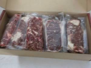 lot 324 image: L Beef Ribeye Frozen Lip-On Steak 10.30 lb. box