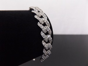 lot 17 image: NEW .925 Sterling Silver Zirconia Crystal Curb Link Bolo Bracelet