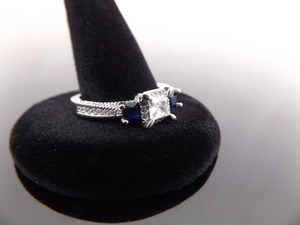 lot 26 image: NEW .925 Sterling Silver Sapphire Crystal Ring Size 8.5