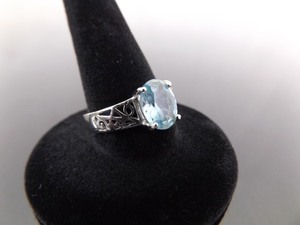 lot 27 image: .925 Sterling Silver Topaz Crystal Scrolled Ring Size 6.75