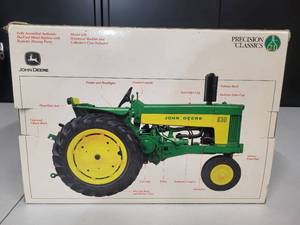 lot 24 image: John Deere Model 630 Tractor precision classics 116