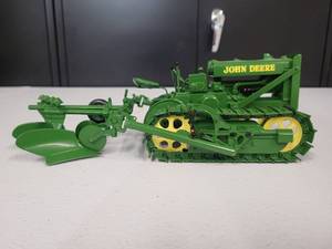 lot 54 image: John Deere Crawler with 2 Bottom Plow 116 Scale