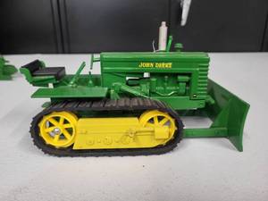 lot 56 image: John Deere Crawler Model MC, with Blade 116 Scale