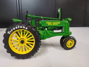 lot 67 image: John Deere Model Unknown Firestone AG Limited Edition 116 Scale #2821 out of 7500