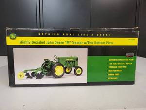 lot 100 image: John Deere Model M Tractor with 2 bottom plow 116 Scale
