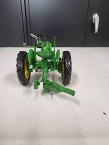 lot 116 image: John Deere Model Unknown with 1 Bottom Plow 116 Scale