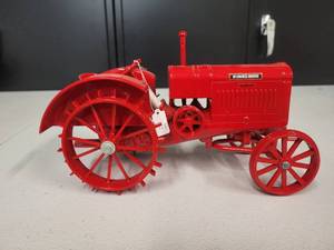 lot 123 image: McCormick  Deering Tractor 116 Scale