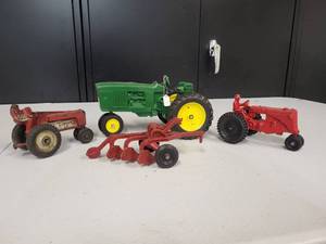 lot 132 image: Tractor and 3 bottom plow lot, brands unknown